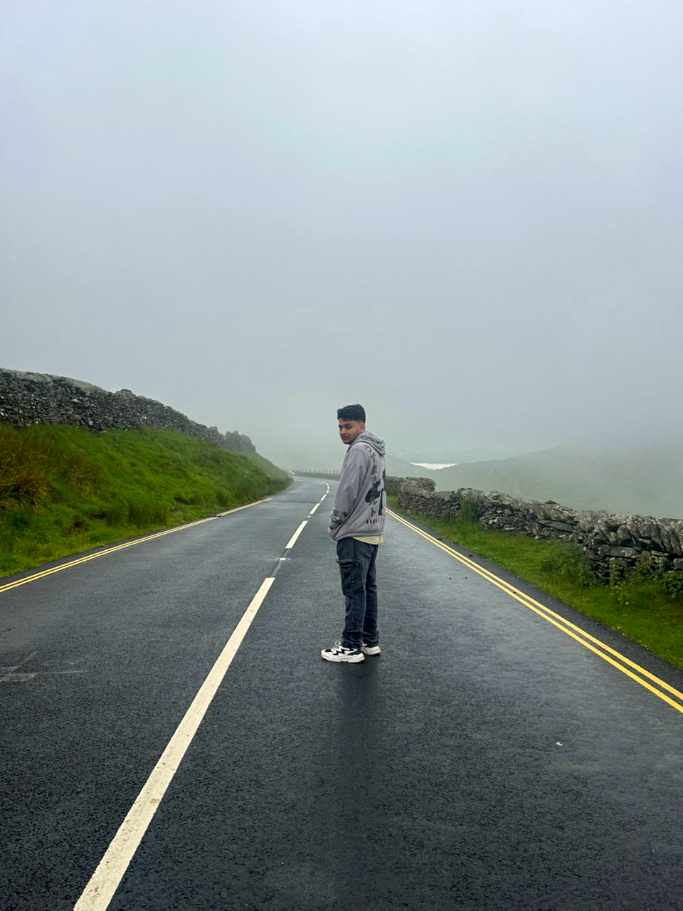 Krish on misty road